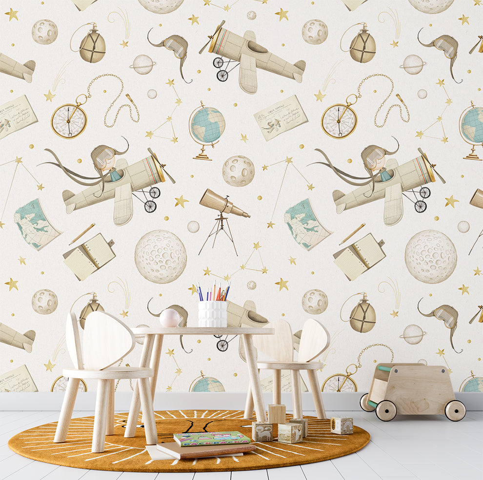 Children's room with a wallpaper featuring vintage toys and space-themed elements.